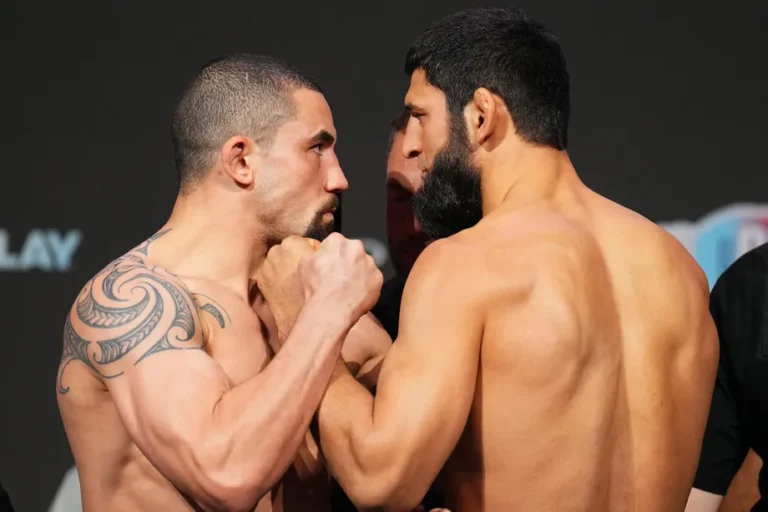 Video: Robert Whittaker, Khamzat Chimaev exchange icy stares in faceoff ahead of UFC 308